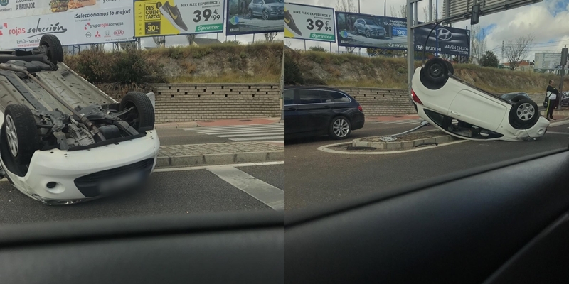 Vuelco de un turismo en la intersección de la carretera de Sevilla