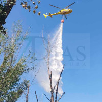 Grave tras sufrir la descarga de un helicóptero en el incendio de Alía (CC)